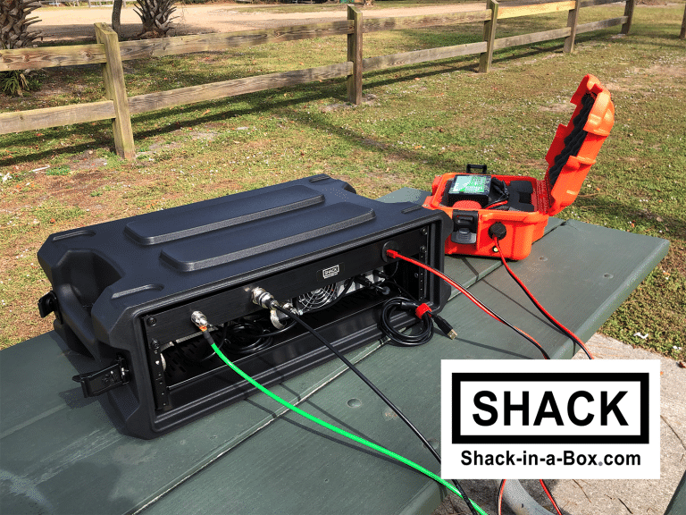 Rear connections of the HF1-7300 Go Box beside the orange battery box