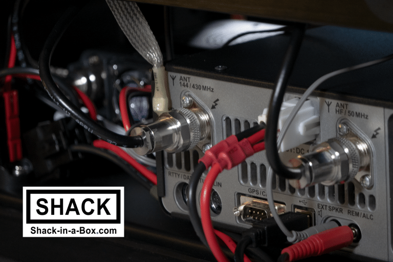 Close-up of the wiring and cables behind the radios in the Yaesu All-in-One Go Box