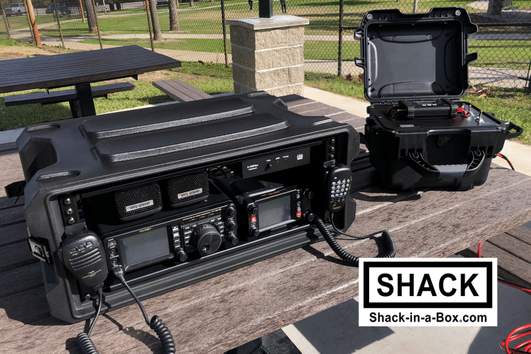 Yaesu All-in-One Go Box on a picnic table with a Solaris power system case in the background